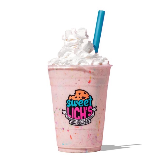 A milkshake topped with whipped cream